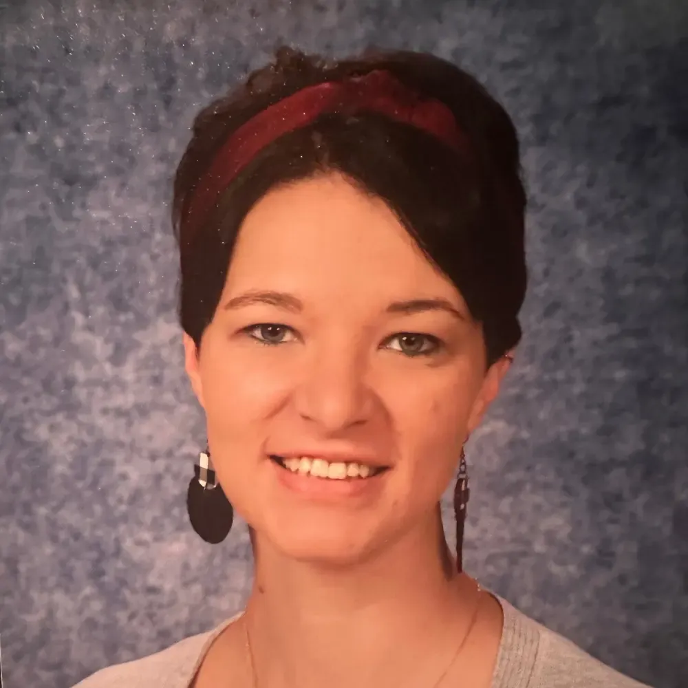 Headshot of Amber Davies, Teacher Success & Community Lead