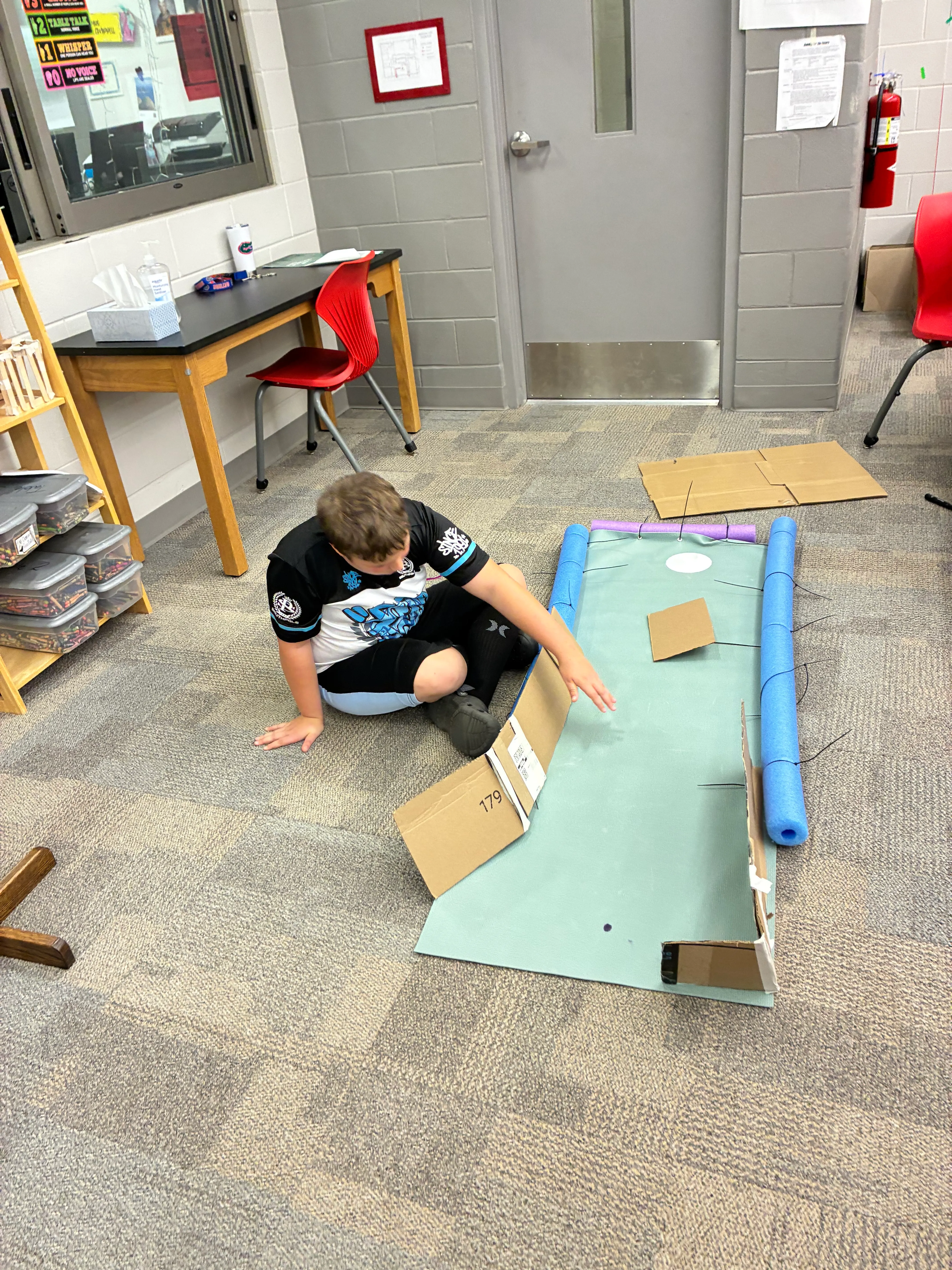 Student-built cardboard mini-golf holes in Lilly Chappell’s classroom.