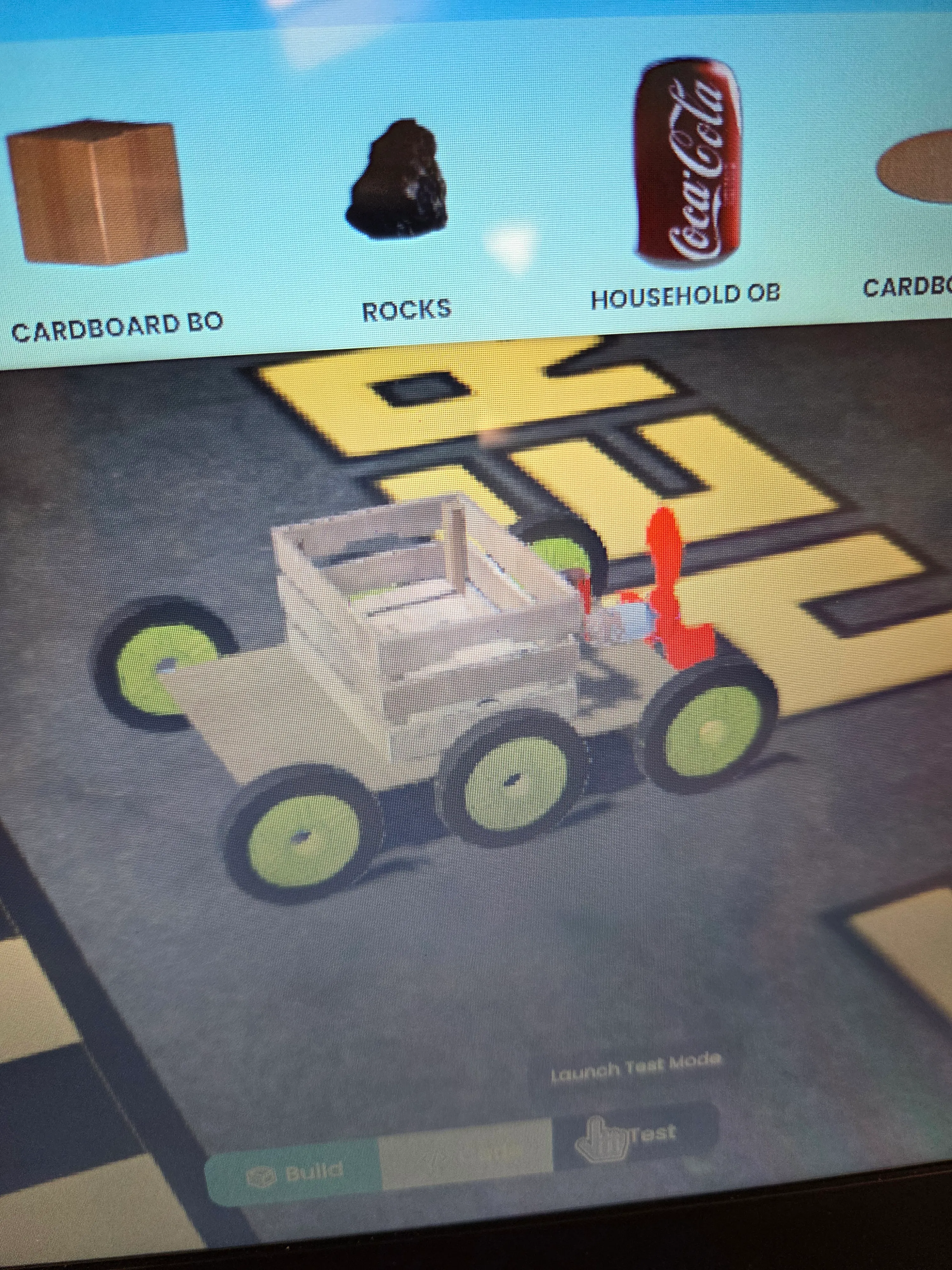 Household objects a student gathered to build a Mars Rover in Regina’s classroom.